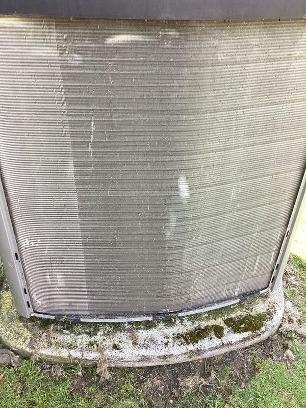 Completed comprehensive maintenance service on 11-year-old Lennox Industries central air conditioning system. Addressed customer concerns regarding system noise while confirming unit maintained proper heating and cooling functionality. Performed routine maintenance inspection, documenting exterior unit condition including significant weathering on condenser panels, biological growth on base components, and deteriorated concrete pad with moss accumulation. Renewed annual maintenance plan to ensure continued system performance and longevity.