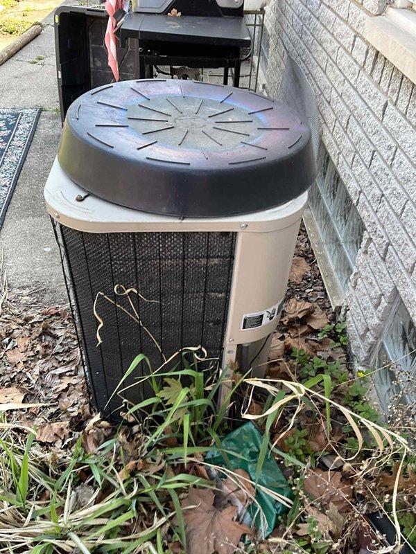 Completed full system estimate for residential HVAC replacement. Inspected and photographed existing 19-year-old outdoor condenser unit showing signs of weathering, rust accumulation, and poor maintenance with vegetation growth around base. Evaluated indoor furnace and ductwork installation in basement utility area. Provided comprehensive replacement options for complete heating and cooling system, as current equipment is approaching end of service life though still operational.