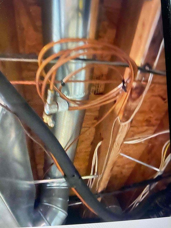 Responded to callback regarding exposed piping following dual furnace and air conditioning system installation. Upon inspection, located refrigerant lines and associated wiring that required proper securing to structural members. Utilized additional mounting hardware and zip ties to fasten all copper refrigerant lines, condensate tubing, and electrical wiring to ceiling joists, eliminating any hanging or unsupported components. Verified all mechanical connections remained secure and system operation was unaffected by adjustments.