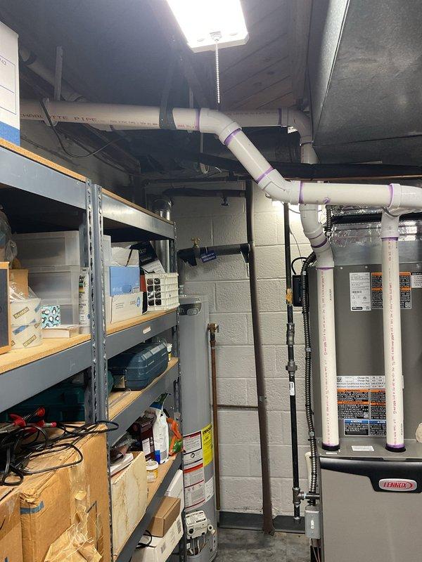 Completed warranty work on 6-month-old furnace installation where PVC exhaust piping was left unfinished due to deck obstruction during original install. Customer reported exhaust pipe full of water and gurgling sounds. With deck section now removed and full access available, completed the PVC exhaust pipe installation per manufacturer specifications, ensuring proper pitch and drainage to eliminate water accumulation and gurgling condition in the condensate drainage system.