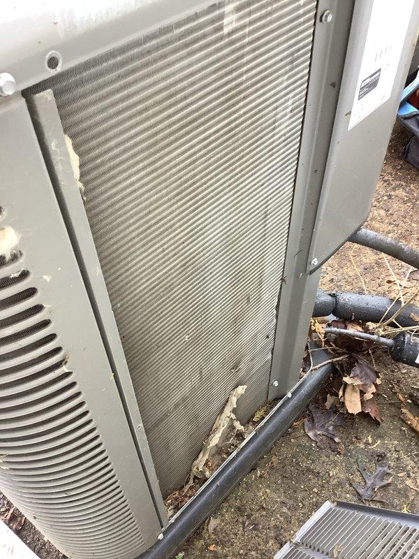 Completed scheduled preventive maintenance on residential air conditioning system. Performed temperature diagnostics using infrared thermometer, recording supply air temperature of 62.6°F to verify proper cooling performance. Inspected outdoor condensing unit, noting normal operational condition of condenser coil and heat exchanger with typical seasonal debris accumulation around base. All components functioning within manufacturer specifications at time of inspection.