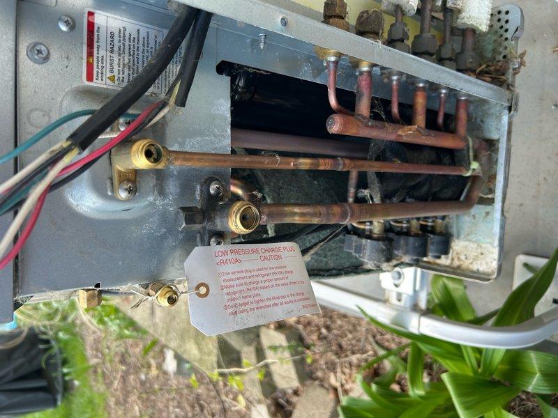 Performed nitrogen leak test on mini split system under full warranty coverage. System passed pressure test with no leaks detected. Added refrigerant charge to manufacturer specifications and verified proper operation of all components.