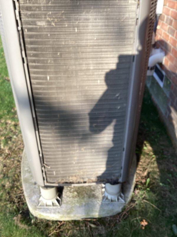 Completed annual cooling maintenance on two residential air conditioning units. Inspected both outdoor condensers, noting significant dust and debris accumulation on coil fins requiring cleaning. Both units showed typical wear from outdoor exposure with surface dirt, weathering on mounting pads, and algae growth on concrete bases. Performed standard ACM protocol including visual inspection of casings, coil condition assessment, and documentation of equipment status through photographs.