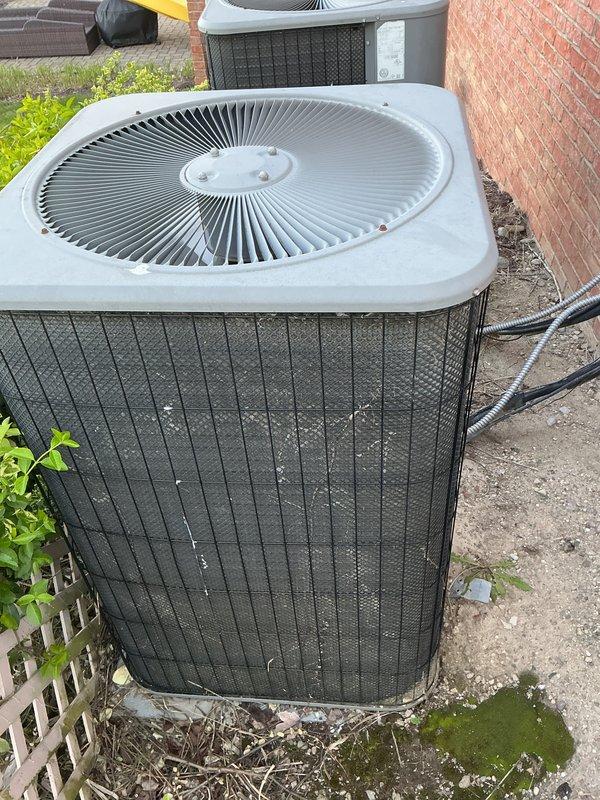 Completed annual cooling maintenance on two outdoor condensing units located at residential property. Performed comprehensive system inspection including electrical connections, refrigerant line integrity, condenser coil condition, and operational testing of both units. All components found to be functioning within normal parameters with no immediate service needs identified.