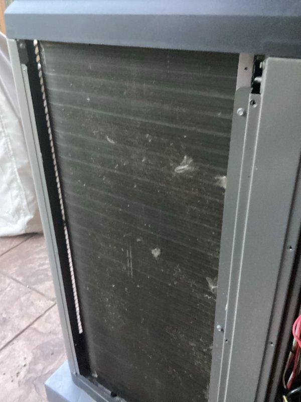 Completed annual cooling maintenance on HVAC system. Inspected evaporator coil and noted significant dust and debris accumulation on fin surfaces requiring attention. Replaced air filters and evaporative cooling pads as needed to restore proper airflow and system efficiency.