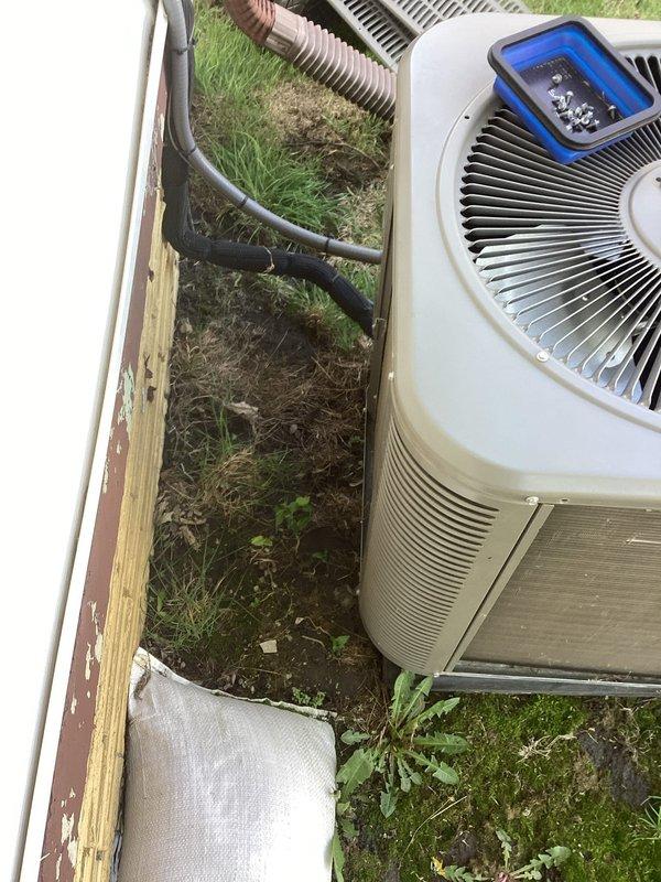 Performed routine air conditioning maintenance on residential condensing unit. Conducted system diagnostics using digital manifold gauges to verify refrigerant pressures and operating temperatures, inspected electrical connections, cleaned condenser coil, and confirmed proper airflow through fan assembly. All components found operating within manufacturer specifications with no deficiencies noted.