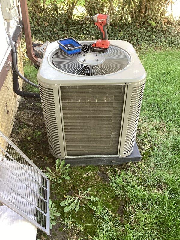 Performed routine air conditioning maintenance on residential condensing unit. Conducted system diagnostics using digital manifold gauges to verify refrigerant pressures and operating temperatures, inspected electrical connections, cleaned condenser coil, and confirmed proper airflow through fan assembly. All components found operating within manufacturer specifications with no deficiencies noted.