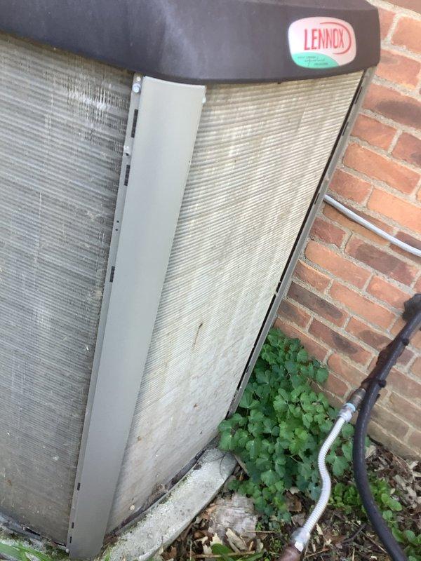 Completed scheduled maintenance on Lennox air conditioning unit. Performed standard AHC maintenance protocol including filter replacement and condenser coil cleaning, which showed significant debris accumulation on exterior surfaces. Removed vegetation growth around unit base and cleared accumulated leaves and debris from equipment area to ensure proper airflow and system operation.
