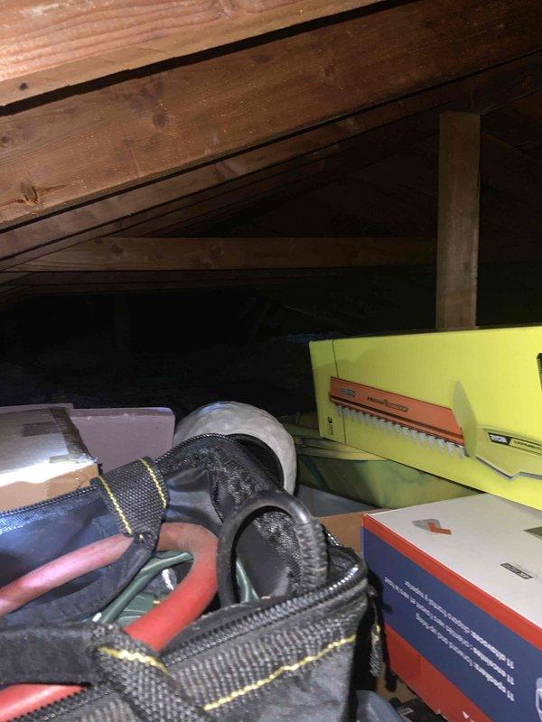 Conducted comprehensive estimate for full HVAC system installation at residential property currently equipped with boiler/steam heat and no existing central air conditioning. Assessed attic space for equipment placement and ductwork routing, documenting existing structure including exposed wooden rafters, roof decking, and current insulation conditions. Evaluated feasibility of installing complete forced-air system including new air conditioning unit, furnace, and full duct distribution network throughout home. Photographed attic access points, available clearances for equipment installation, and structural conditions to determine optimal placement of air handler and ductwork pathways. Customer requested expedited installation timeline within next couple weeks for conversion from steam heat to modern central HVAC system with cooling capability.