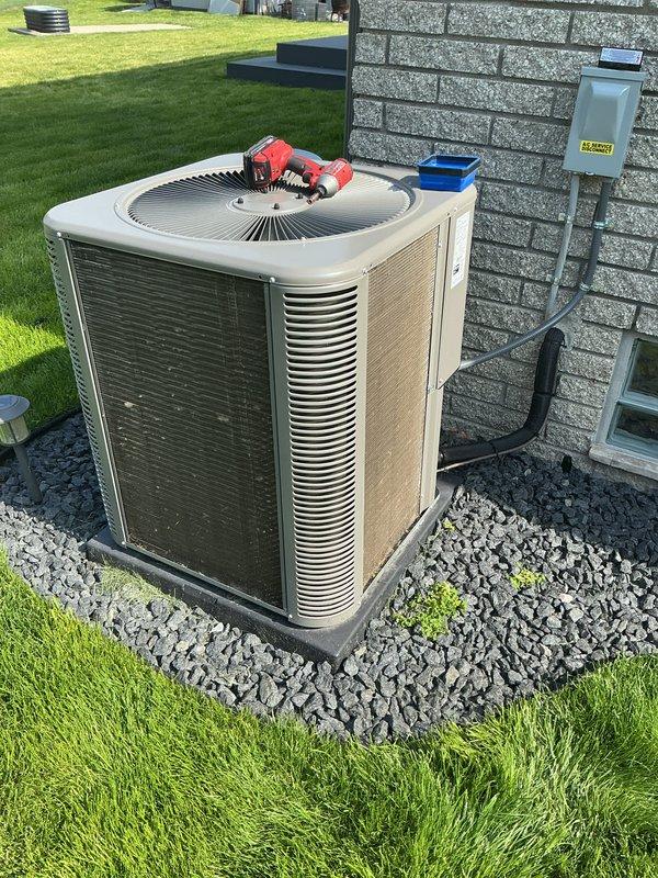 Completed scheduled air conditioning maintenance on residential condensing unit. Inspected outdoor unit components, checked electrical connections at disconnect box, and serviced filter/pad system. Unit operating within normal parameters upon completion of preventive maintenance procedures.