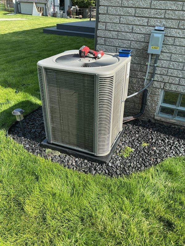 Completed scheduled air conditioning maintenance on residential condensing unit. Inspected outdoor unit components, checked electrical connections at disconnect box, and serviced filter/pad system. Unit operating within normal parameters upon completion of preventive maintenance procedures.
