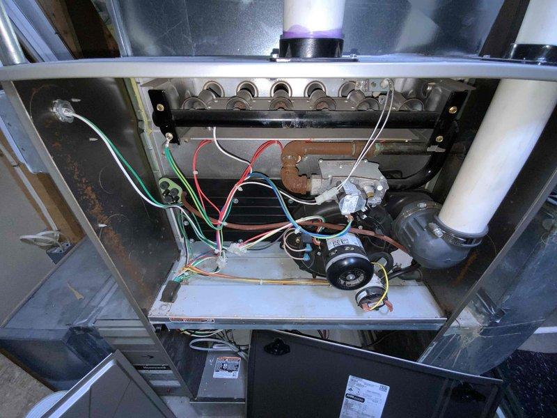 Completed comprehensive estimate for replacement of 12+ year old heating and cooling system in large residential property exceeding 3000 square feet. Evaluated existing basement-located furnace and air conditioning equipment, both currently operational but beyond recommended service life. Provided replacement recommendations for complete heating and cooling system upgrade to electric heat pump technology, transitioning from natural gas fuel source to improve energy efficiency for the home's square footage requirements.