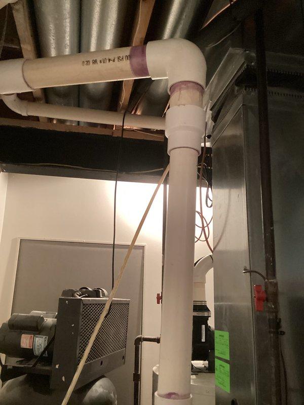 Completed full installation of 4-ton air conditioning system with matching evaporator coil. Obtained mechanical and electrical permits prior to installation. Installed new outdoor condensing unit with right-side refrigerant line configuration, connected copper refrigerant lines to indoor evaporator coil mounted above existing furnace, and established proper refrigerant circuit. Completed all electrical reconnections to power the new AC system. Installed PVC condensate drain piping to handle moisture removal from the evaporator coil. Verified proper system operation, airflow, and refrigerant charge levels. All work performed to code requirements and manufacturer specifications. System tested and operational upon completion.