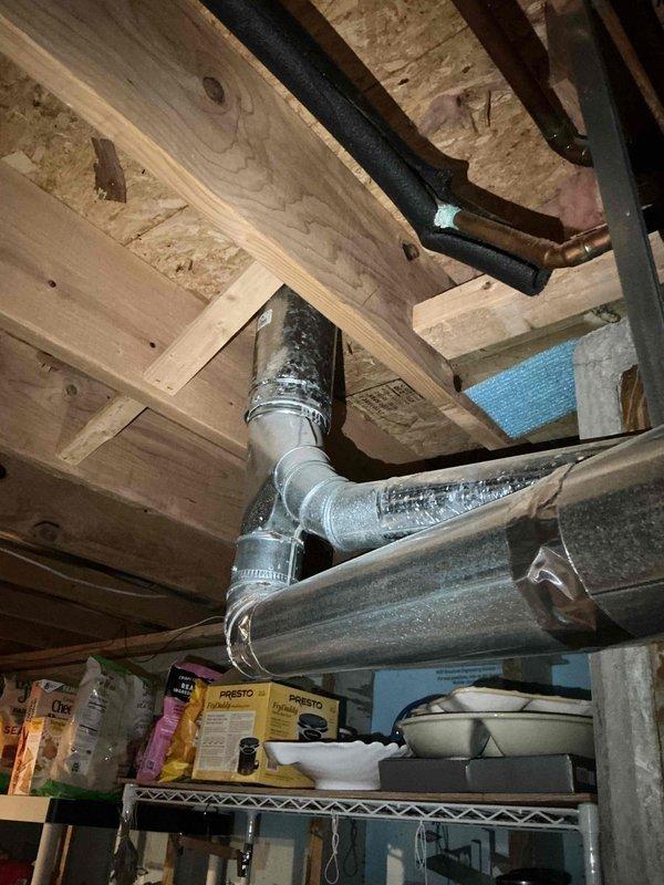 Conducted on-site evaluation of 20-year-old air conditioning system with suspected refrigerant leak. Assessed existing HVAC equipment including furnace, air handler, and ductwork configuration in basement installation to provide comprehensive replacement quote for complete system upgrade due to age and operational concerns.