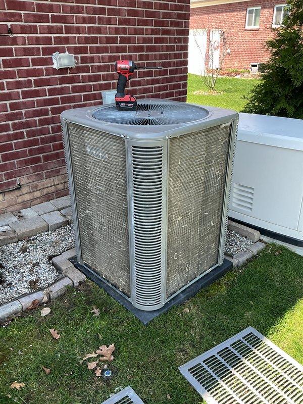 Completed annual preventive maintenance on residential split system air conditioning unit. Performed comprehensive inspection of outdoor condenser unit including removal of access panels for internal component examination, verified proper operation of condenser fan motor, assessed refrigerant line connections, and inspected electrical connections and contactors. Unit found to be in good operating condition with no deficiencies noted.