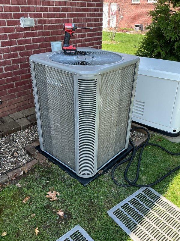 Completed annual preventive maintenance on residential split system air conditioning unit. Performed comprehensive inspection of outdoor condenser unit including removal of access panels for internal component examination, verified proper operation of condenser fan motor, assessed refrigerant line connections, and inspected electrical connections and contactors. Unit found to be in good operating condition with no deficiencies noted.