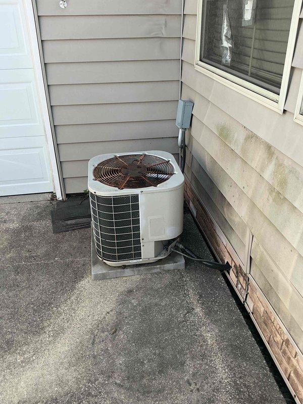 Conducted HVAC replacement estimate for 16-year-old R22 air conditioning system that is no longer operational. Evaluated existing outdoor condenser unit and indoor Revolv furnace, which remains functional. Provided multiple replacement options including AC-only configurations and buy-one-get-one package solutions to address obsolete refrigerant system while preserving working furnace equipment.