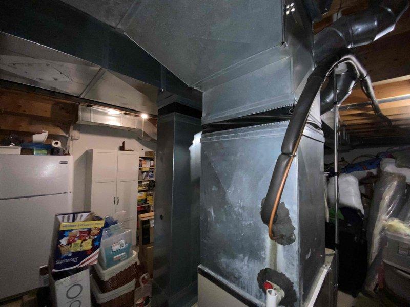 Provided estimate for replacement of 17-year-old natural gas furnace located in basement and 26-year-old air conditioning unit located outside. Current furnace operational but air conditioning unit not working. Assessed existing Lennox furnace installation with metal ductwork system and evaluated replacement options for complete HVAC system upgrade.