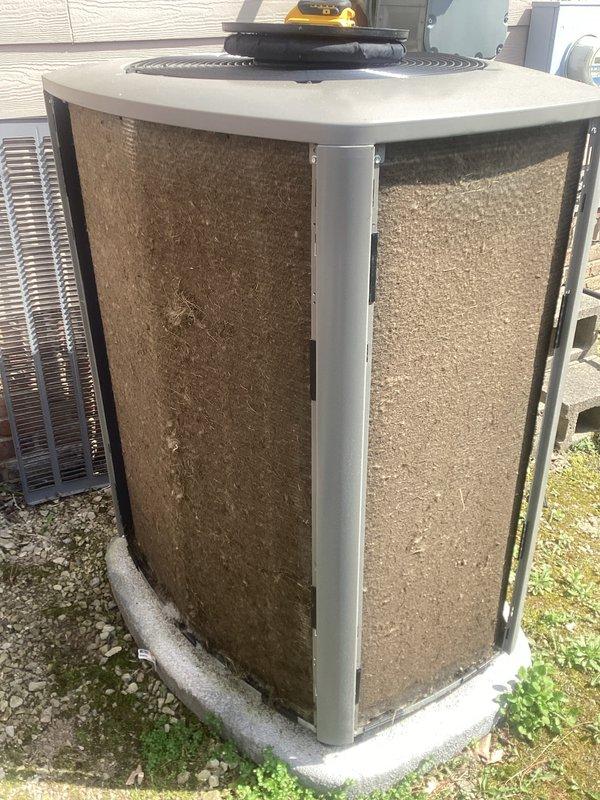 Completed scheduled air conditioning maintenance on two outdoor condenser units. Performed comprehensive system inspection, tested electrical components with multimeter, and documented equipment condition with photos showing normal wear and environmental soiling on exterior panels.