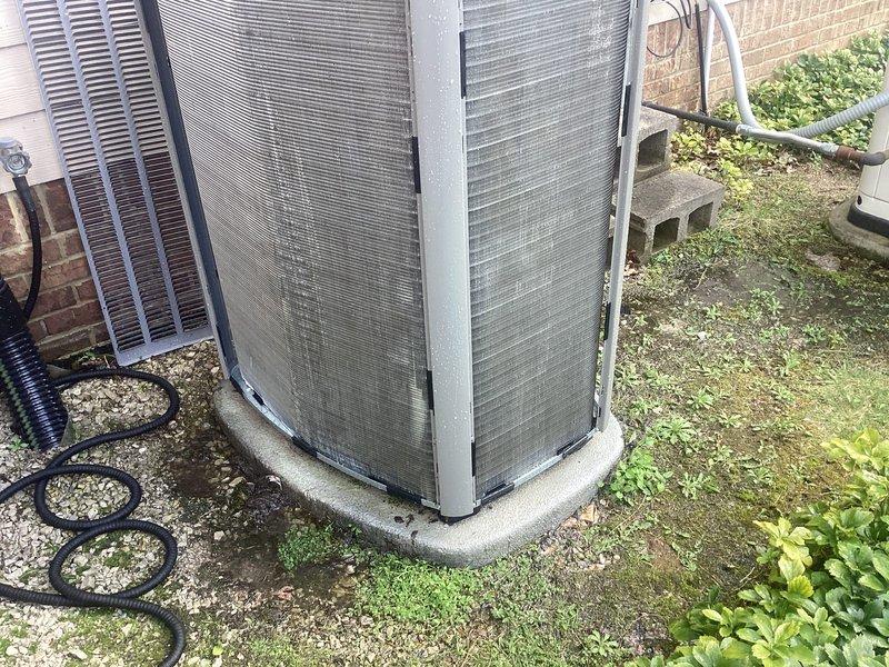 Completed scheduled air conditioning maintenance on two outdoor condenser units. Performed comprehensive system inspection, tested electrical components with multimeter, and documented equipment condition with photos showing normal wear and environmental soiling on exterior panels.