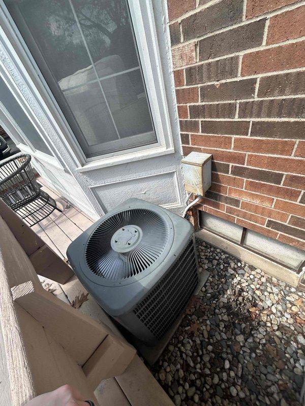 Conducted replacement estimate for 16-year-old residential air conditioning system experiencing chronic refrigerant loss. Assessed existing outdoor condenser unit and indoor components, documented current installation configuration including PVC condensate drainage and electrical disconnect. Provided customer with equipment replacement options and recommendations due to ongoing refrigerant leak issues making repair cost-prohibitive for aging system.