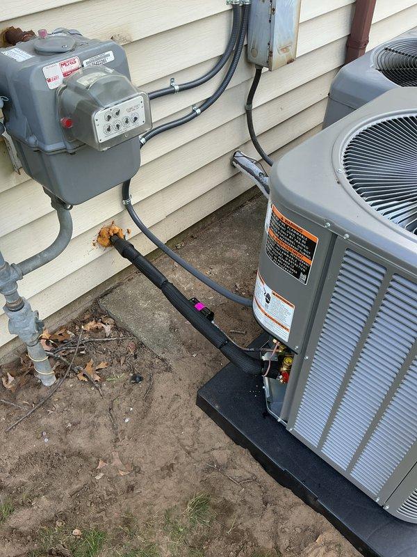 Completed full HVAC system installation including a Lennox 70,000 BTU furnace and 2-ton air conditioning unit with rear discharge configuration. Installed furnace in interior utility closet with proper ductwork connections, flexible conduit, and copper refrigerant lines with insulation. Mounted AC condenser unit outdoors on concrete pad with rubber isolation mounts and completed all electrical connections including disconnect box and conduit runs. Verified all mechanical and electrical connections, reconnected system components, installed safety shut-off valves on gas lines, and ensured proper clearances for all equipment. System tested and operational upon completion.