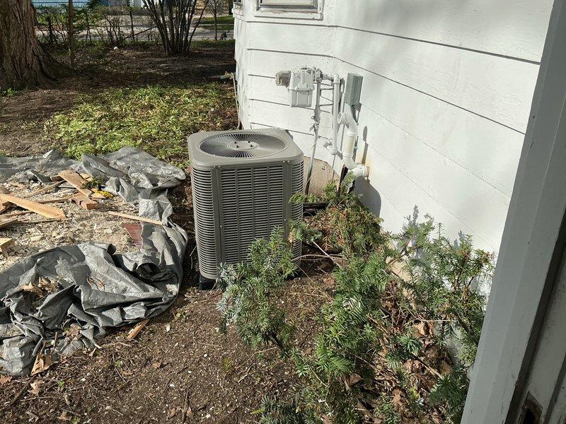 Completed full HVAC system installation including 70,000 BTU gas furnace with liner and humidifier in basement location, and 2-ton air conditioning condenser unit with rear discharge configuration at exterior of residence. Installed all necessary ductwork connections, electrical disconnects, and refrigerant line sets, then reconnected existing system components to new equipment and verified proper operation of complete heating and cooling system.