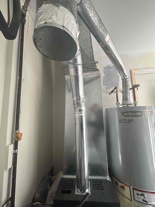 Provided estimate for air conditioning replacement at residential property with medium-sized cooling system serving 1200-2000 square feet. Inspected existing outdoor condenser unit showing weathering and age-related wear, along with basement mechanical room housing newer furnace and water heater with associated ductwork. Quoted AC-only replacement options to work with existing furnace system, focusing on budget-conscious solutions to meet requested pricing parameters.