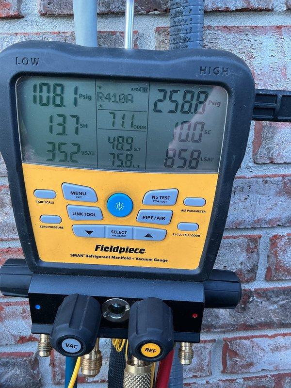 Performed annual preventive maintenance on residential split system air conditioning unit. Conducted comprehensive system diagnostics using refrigerant manifold gauges, recording operating pressures of 108 PSIG on low side and 258 PSIG on high side with R-410A refrigerant. Measured and documented system performance parameters including superheat at 100°F, subcooling at 358°F, and airflow at 137 CFM to verify proper operation. Inspected outdoor condenser unit, confirmed proper fan operation, and verified electrical connections at disconnect box. Unit operating within normal parameters with no deficiencies noted.