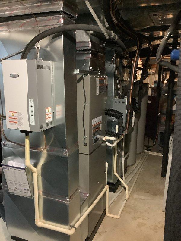 Completed full dual-system HVAC installation in residential basement, installing two complete furnace and air conditioning systems. First system consisted of a 70,000 BTU furnace paired with a 3-ton air conditioning unit, while second system featured a 90,000 BTU furnace with an additional 3-ton AC unit for rear zone coverage. All mechanical permits obtained and approved prior to installation. Successfully installed both furnace units with proper PVC venting systems, connected refrigerant lines, installed ductwork connections, and established all electrical connections. Reconnected existing components as needed and verified proper operation of both complete systems. Installation completed with all equipment properly labeled, vented, and positioned for optimal performance and serviceability in basement mechanical room.
