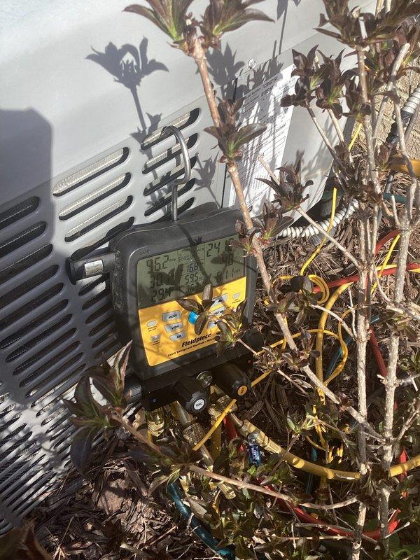 Completed annual cooling maintenance on residential air conditioning system. Performed system diagnostics with digital multimeter, recording operational parameters and verifying proper electrical values. Replaced air filter and cleared vegetation debris from around condenser unit to ensure adequate airflow and prevent obstruction of ventilation grilles.