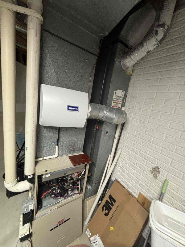 Completed on-site evaluation and provided comprehensive estimate for full HVAC system replacement of 20+ year old air conditioning unit and furnace. AC unit was depleted of refrigerant and no longer operational. Assessed existing equipment in mechanical room, including furnace with humidifier attachment and associated ductwork. Documented current system configuration and discussed replacement options with homeowner for both heating and cooling components based on previous technician's recommendation for complete system upgrade.