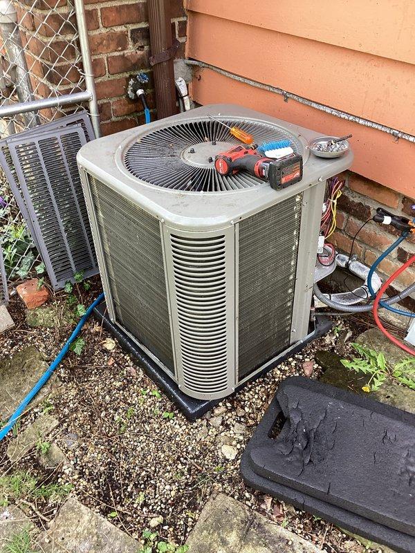 Completed annual cooling maintenance on residential air conditioning system. Performed comprehensive inspection of outdoor condensing unit, tested electrical components and refrigerant pressures using digital gauges, verified proper operation of condenser fan motor, and inspected refrigerant line connections along exterior wall. Unit operating within normal parameters with no deficiencies noted.