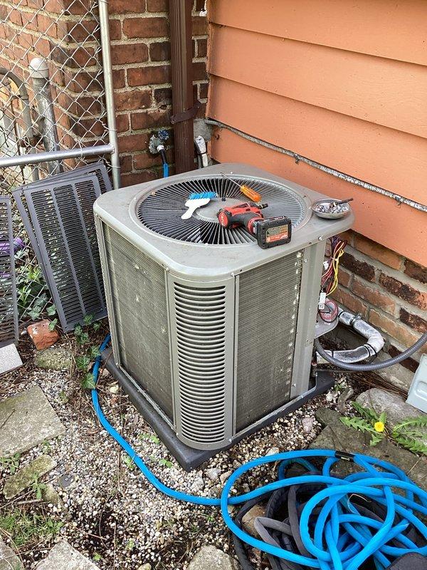 Completed annual cooling maintenance on residential air conditioning system. Performed comprehensive inspection of outdoor condensing unit, tested electrical components and refrigerant pressures using digital gauges, verified proper operation of condenser fan motor, and inspected refrigerant line connections along exterior wall. Unit operating within normal parameters with no deficiencies noted.