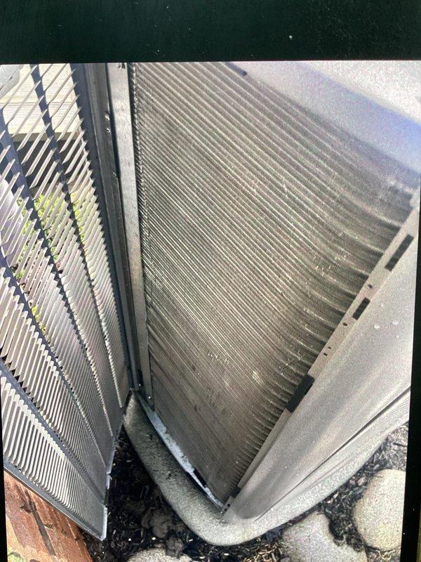 # HVAC Maintenance - ACM

Completed annual cooling maintenance on outdoor condenser unit. Performed comprehensive inspection of condenser coil assembly, which showed significant accumulation of dirt, dust, and debris between fins requiring attention. Coil fins were intact without bending or damage. Cleaned condenser coils to restore proper heat transfer efficiency and airflow. Replaced air filter and evaporator pad as scheduled maintenance items. Verified unit operation and proper drainage. All components functioning within normal parameters upon completion.