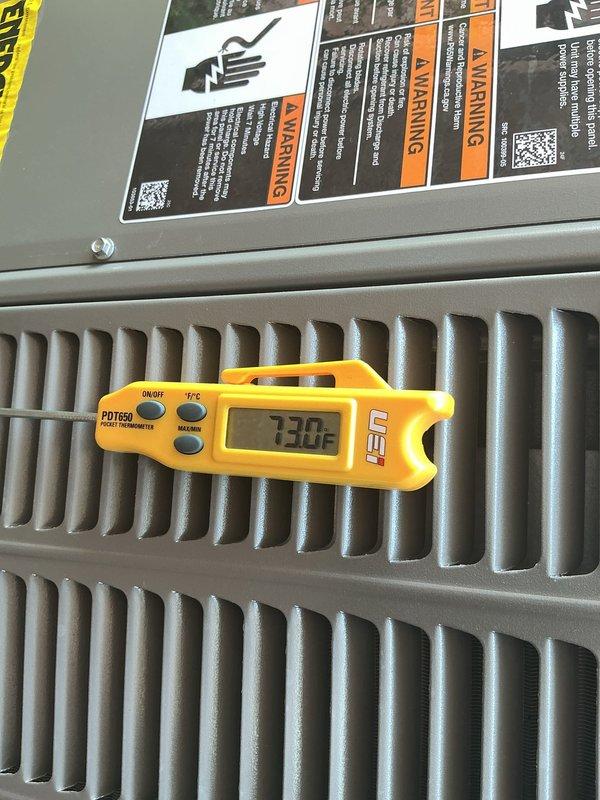 Responded to callback for 3-month-old A/C unit running constantly with gurgling sounds. Inspected outdoor unit and measured discharge air temperature at 130.8°F, indicating normal compressor operation. Checked refrigerant charge and found system slightly overcharged, causing continuous operation and gurgling noise in refrigerant lines. Recovered excess refrigerant to manufacturer specifications, verified proper cycling of thermostat and contactor, and confirmed supply air temperature at register reading 57.5°F with normal system shutdown. Unit now operating within normal parameters under parts and labor warranty.