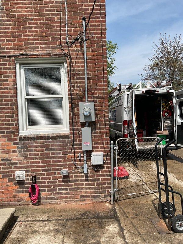 Successfully completed 100-amp electrical panel upgrade at residential property. Removed existing outdated panel and installed new 100-amp main service panel with updated circuit breakers to meet current electrical code requirements. Coordinated installation with concurrent HVAC system replacement, ensuring proper dedicated circuit provision for new 2-ton air conditioning unit and 70K BTU furnace. Installed exterior meter housing and disconnect box on brick exterior wall with appropriate conduit runs from service entrance to new panel location. All electrical connections properly terminated and torqued to manufacturer specifications. Verified proper grounding and bonding throughout system. Final installation inspected and tested for voltage, amperage capacity, and circuit integrity prior to energizing system.