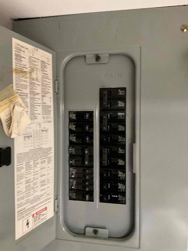Conducted comprehensive site evaluation for full HVAC split system replacement of 30-year-old air conditioning unit and furnace. Inspected existing Carrier condenser unit located on exterior pad, assessed electrical service including meter base, disconnect switch, and main breaker panel with circuit directory. Documented current system configuration, electrical connections, and conduit routing from outdoor equipment to interior panel. Photographed equipment specifications, installation conditions, and electrical infrastructure to provide accurate replacement estimate for complete system upgrade scheduled within next 30 days.