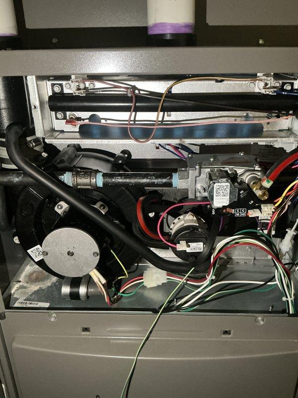 Completed annual HVAC maintenance inspection on residential furnace and air conditioning system. Removed access panels and performed comprehensive visual inspection of all internal components including heat exchanger, blower motor assembly, refrigerant lines, electrical connections, control board, and safety devices. All components found operating within normal parameters with no immediate service needs identified. Documented system condition with photographs for service records.