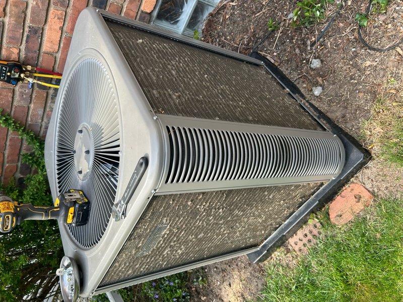 Completed annual cooling maintenance on residential air conditioning system. Inspected outdoor condenser unit, noting significant dirt and debris accumulation on coil surfaces. Cleaned condenser coils, checked refrigerant levels, verified electrical connections, tested fan motor operation, and confirmed system is operating within manufacturer specifications.