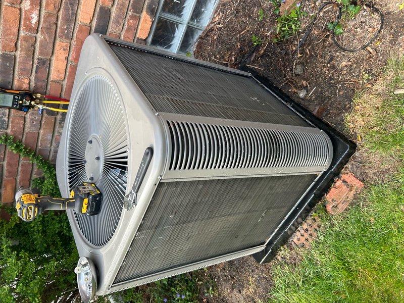 Completed annual cooling maintenance on residential air conditioning system. Inspected outdoor condenser unit, noting significant dirt and debris accumulation on coil surfaces. Cleaned condenser coils, checked refrigerant levels, verified electrical connections, tested fan motor operation, and confirmed system is operating within manufacturer specifications.