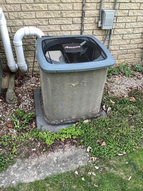 # HVAC Maintenance - ACM Completed

Performed annual cooling maintenance on residential Amana condenser unit. Conducted comprehensive system inspection including visual assessment of outdoor unit condition, electrical connections, and refrigerant lines. Inspected humidifier as requested by customer. Checked and evaluated air filter status. Unit showed normal weathering and dirt accumulation on exterior surfaces consistent with outdoor installation. Verified proper clearance around condenser and noted vegetation growth near base of unit. Documented equipment condition through photographic records. All system components inspected and maintenance protocol completed per recurring service agreement specifications.