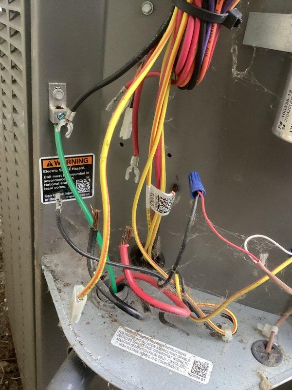 Responded to service call for air conditioning unit making unusual noises during startup cycle. Performed diagnostic inspection of 4-year-old outdoor condensing unit and electrical control panel. Inspected all electrical connections, wire terminations, and control components within the disconnect box and main unit housing. Verified proper wire routing, terminal connections, and wire nut assemblies throughout the electrical system. Examined contactor, capacitor, and control board wiring for signs of arcing, loose connections, or component failure that could cause audible disturbances during compressor startup. All electrical connections found secure and properly terminated. Unit tested through multiple startup cycles to identify source of reported noise.