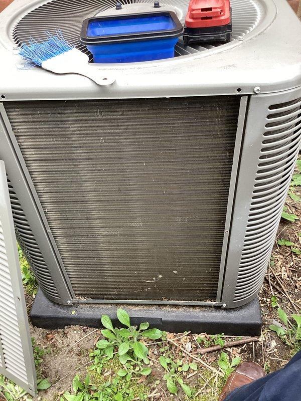 Performed routine maintenance on outdoor condensing unit as part of recurring cooling service. Condenser coils showed significant accumulation of dirt, debris, and organic matter between fins. Cleaned condenser coils using appropriate tools and techniques to restore proper airflow and heat transfer efficiency. Removed leaves, twigs, and other debris from coil surfaces and surrounding unit base. Unit operational upon completion of maintenance.