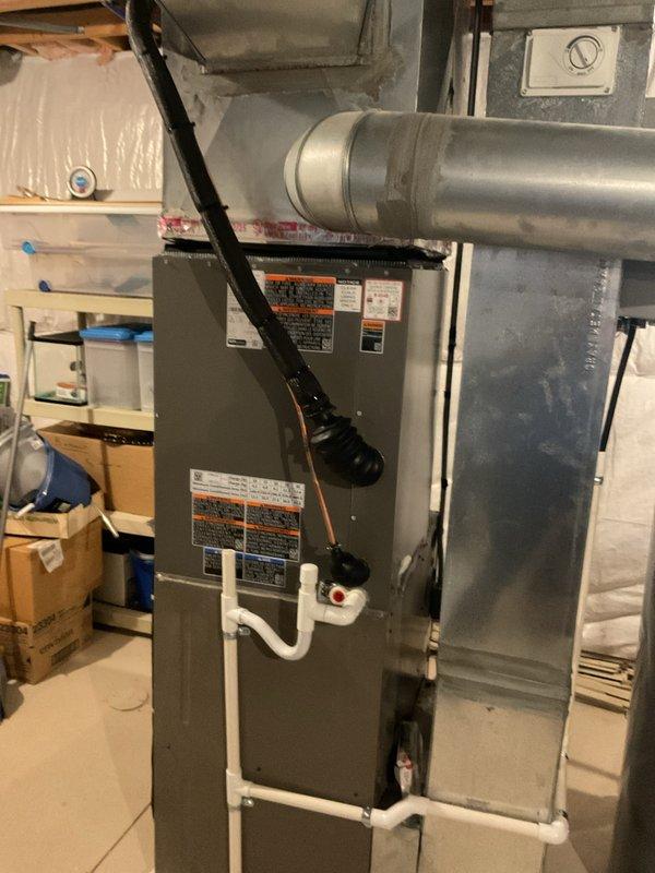 Successfully installed a new 4-ton Lennox air conditioning condenser unit and evaporator coil system. The outdoor condenser was positioned on a concrete pad with proper clearances, connected to electrical disconnect with appropriate conduit routing, and refrigerant lines were run to the indoor coil mounted above the existing furnace. All mechanical, electrical, and refrigeration connections were completed per manufacturer specifications, system was charged with refrigerant, tested for proper operation, and left running efficiently.