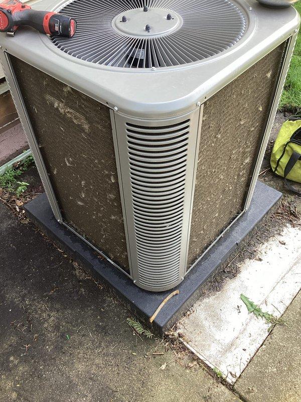 # HVAC Maintenance - AHC Completed

Performed comprehensive preventive maintenance on residential air conditioning system and heating equipment as part of recurring Air Care service agreement. Conducted thorough inspection of outdoor condenser unit, including examination of cabinet condition, fan assembly, and mounting stability. Unit showed normal weathering consistent with outdoor exposure, with accumulated surface dirt and debris noted on louvers and panels. Verified proper installation on rubber isolation pad and concrete foundation. Completed standard maintenance protocols for both cooling and heating systems to ensure optimal performance and reliability for the upcoming season.