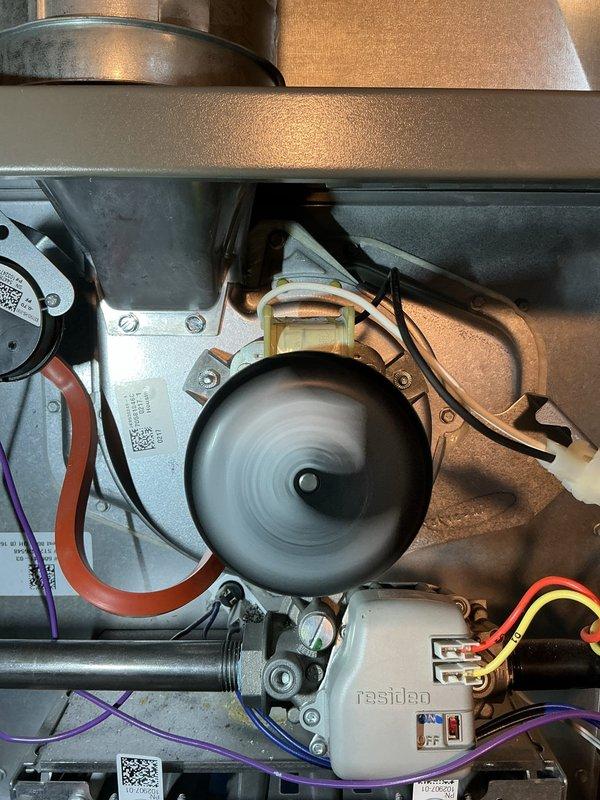 Replaced defective inducer motor assembly on HVAC system under full warranty coverage. Removed failed motor unit, installed new Lennox part number 74W55, and verified proper operation of draft blower system. All electrical connections secured and unit tested for normal functionality.