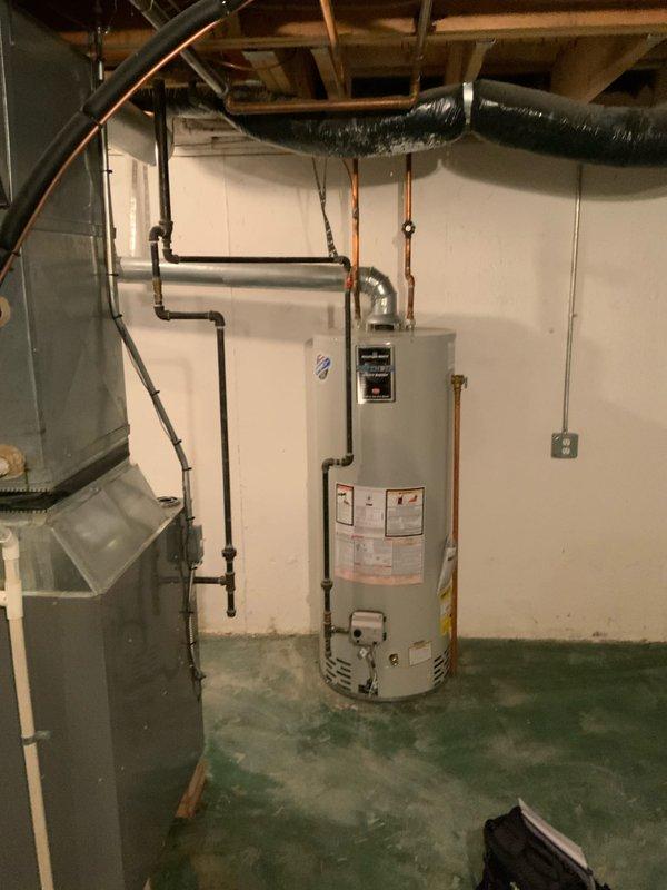 Completed HVAC estimate for cooling system replacement at residential property with medium capacity requirements for 1200-2000 square foot coverage area. Assessed existing outdoor condensing unit positioned against exterior brick wall with copper refrigerant lines and electrical disconnect, along with basement-mounted air handler or furnace system. Provided comprehensive quote for new cooling system installation including equipment specifications, refrigerant line modifications, electrical connections, and integration with existing ductwork infrastructure in basement utility area.
