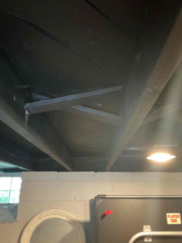 Conducted comprehensive assessment of aging basement-located HVAC system for furnace and air conditioning replacement estimate. Evaluated existing non-functional air conditioning unit and operational furnace system, documenting equipment condition, ductwork configuration, and installation requirements. Photographed mechanical room layout, existing equipment cabinet, exposed ductwork connections, and associated plumbing infrastructure to provide accurate replacement specifications and scope of work for complete system upgrade.