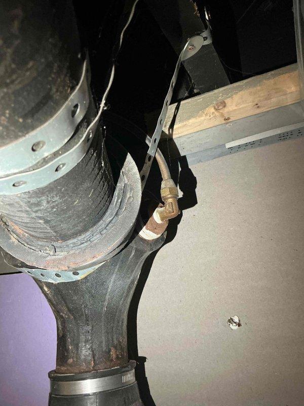 Conducted comprehensive assessment of aging basement-located HVAC system for furnace and air conditioning replacement estimate. Evaluated existing non-functional air conditioning unit and operational furnace system, documenting equipment condition, ductwork configuration, and installation requirements. Photographed mechanical room layout, existing equipment cabinet, exposed ductwork connections, and associated plumbing infrastructure to provide accurate replacement specifications and scope of work for complete system upgrade.